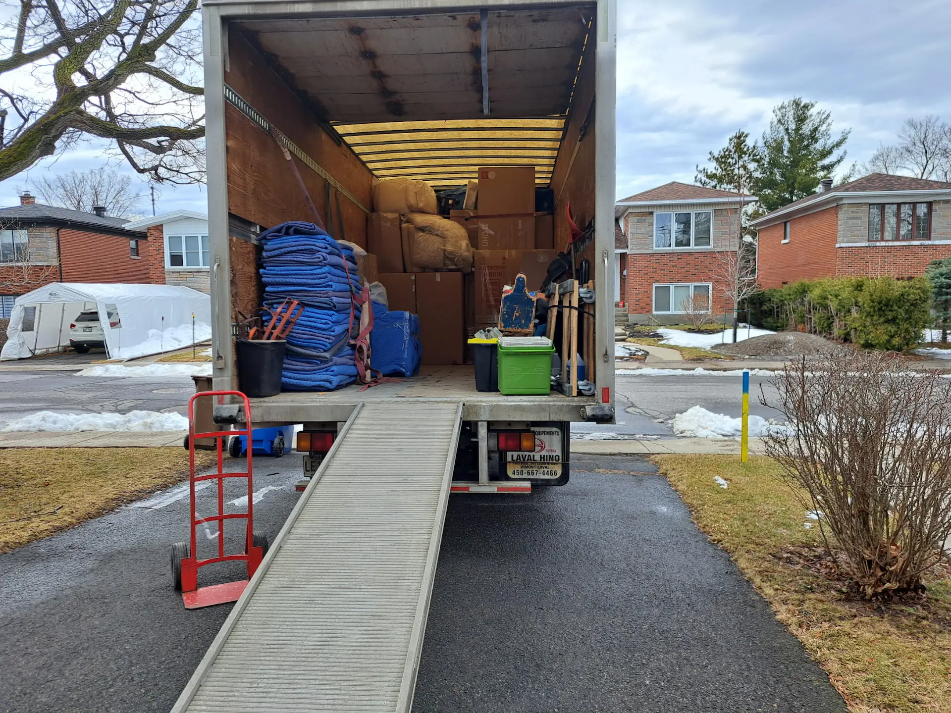 Loaded moving truck prepared for a residential move in Montreal